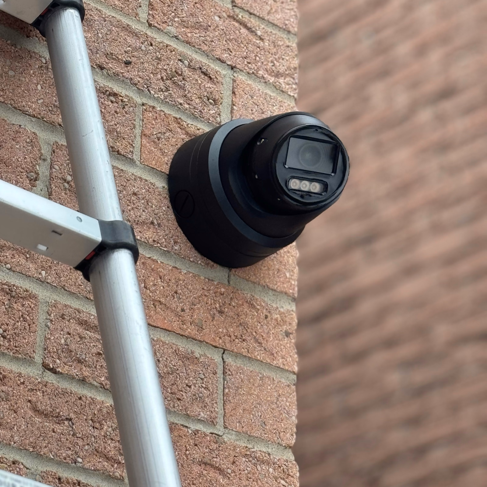 Security camera installation at an Aurora property.