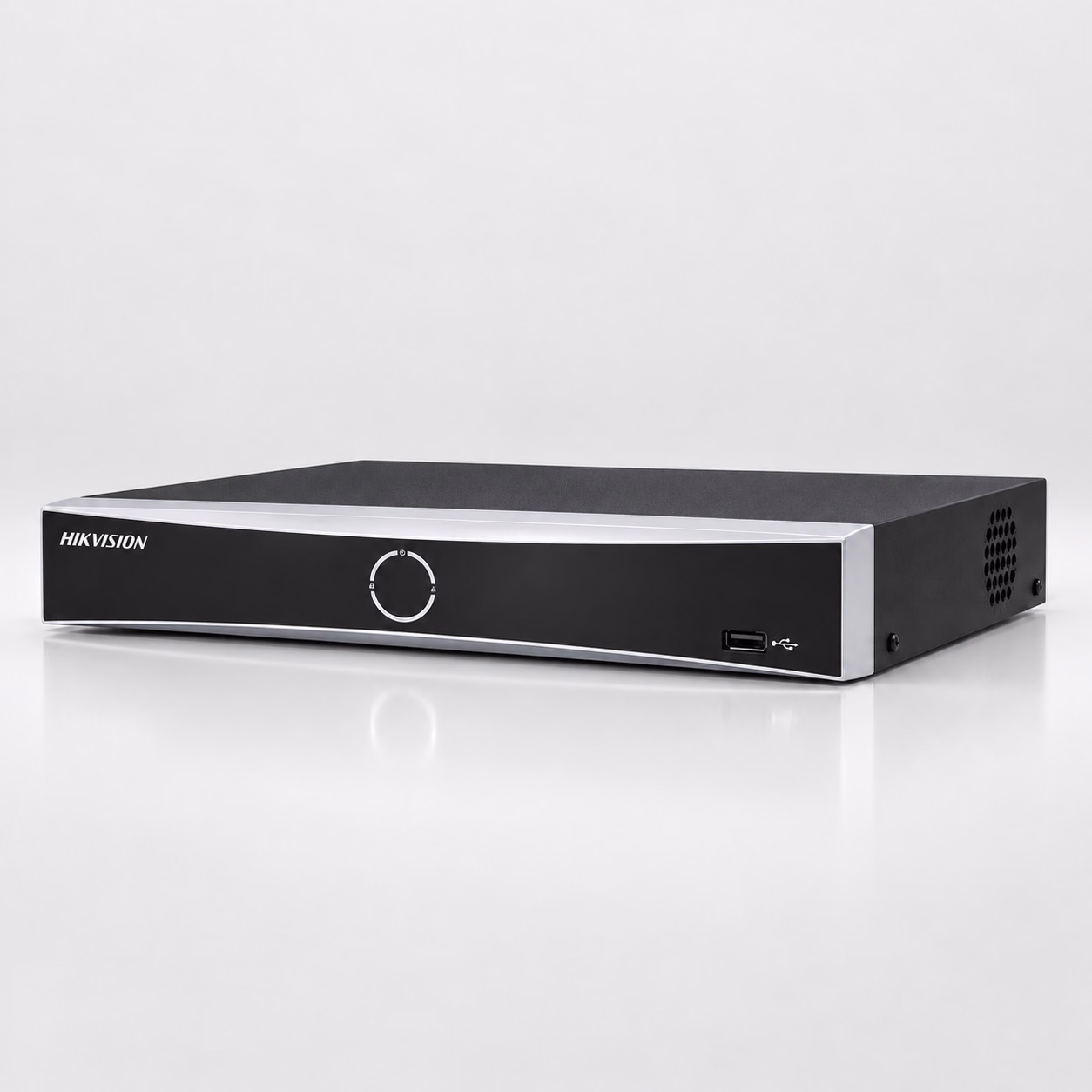 Hikvision security recorder on a light grey background
